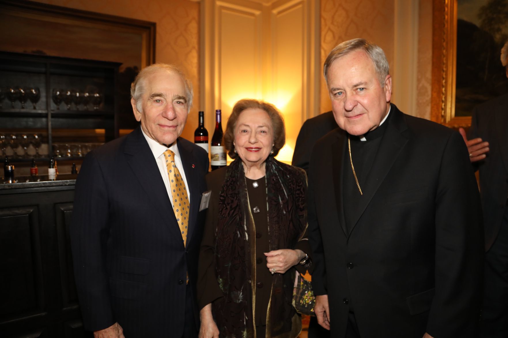 Sam and Marilyn Fox, Archbishop Robert J. Carlson
